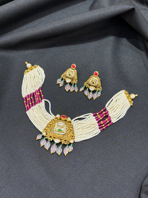 22K Gold Antique Necklace Set with Pearl & Gemstone Detailing 22K Gold Antique Necklace Set with Pearl & Gemstone Detailing