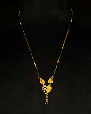 22K Gold and Black Bead Mangalsutra Necklace with Intricate Pendant 22K Gold and Black Bead Mangalsutra Necklace with Intricate Pendant