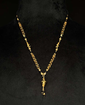 22K Gold and Black Bead Mangalsutra with Intricately Woven Chain and Pendant 22K Gold and Black Bead Mangalsutra with Intricately Woven Chain and Pendant