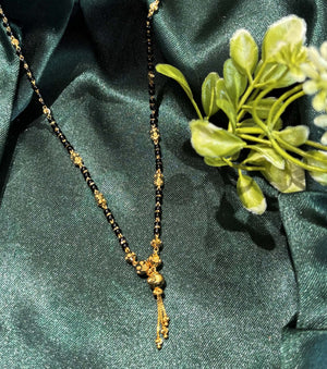 22K Gold and Black Bead Mangalsutra Necklace with Delicate Pendant 22K Gold and Black Bead Mangalsutra Necklace with Delicate Pendant