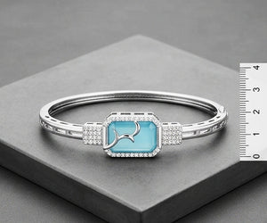 Sky Blue Halo 92.5 Sterling Silver Hinged Bangle Sky Blue Halo 92.5 Sterling Silver Hinged Bangle