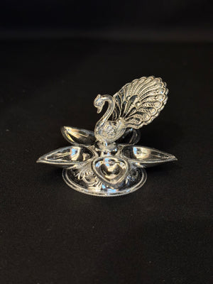 92.5 Sterling Silver Peacock Diya - 5-in-1 Pooja Lamp 92.5 Sterling Silver Peacock Diya - 5-in-1 Pooja Lamp