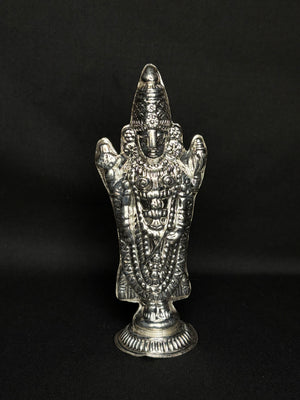 925 sterling silver idol of Lord Venkateswara, intricately crafted with divine detailing. 925 sterling silver idol of Lord Venkateswara, intricately crafted with divine detailing.