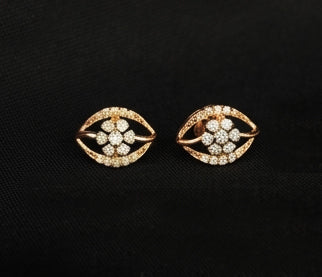 Elegant 14K Two-Tone Spiral Diamond Earrings | Wave Pattern Gold Studs, Gross Wt: 2.08, Net Wt: 2.016, Diamond. Wt 0.32