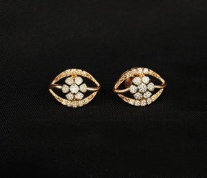 Elegant 14K Two-Tone Spiral Diamond Earrings | Wave Pattern Gold Studs, Gross Wt: 2.08, Net Wt: 2.016, Diamond. Wt 0.32