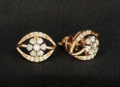 Elegant 14K Two-Tone Spiral Diamond Earrings | Wave Pattern Gold Studs, Gross Wt: 2.08, Net Wt: 2.016, Diamond. Wt 0.32