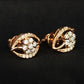 Elegant 14K Two-Tone Spiral Diamond Earrings | Wave Pattern Gold Studs, Gross Wt: 2.08, Net Wt: 2.016, Diamond. Wt 0.32