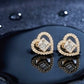 Elegant 14K Gold Swirl Ribbon Diamond Earrings | Fluid Wave Halo Studs, Gross Wt: 2.76, Net Wt: 2.634, Diamond. Wt 0.63