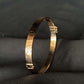 22K Gold Bangle with Iconic Screw Motif