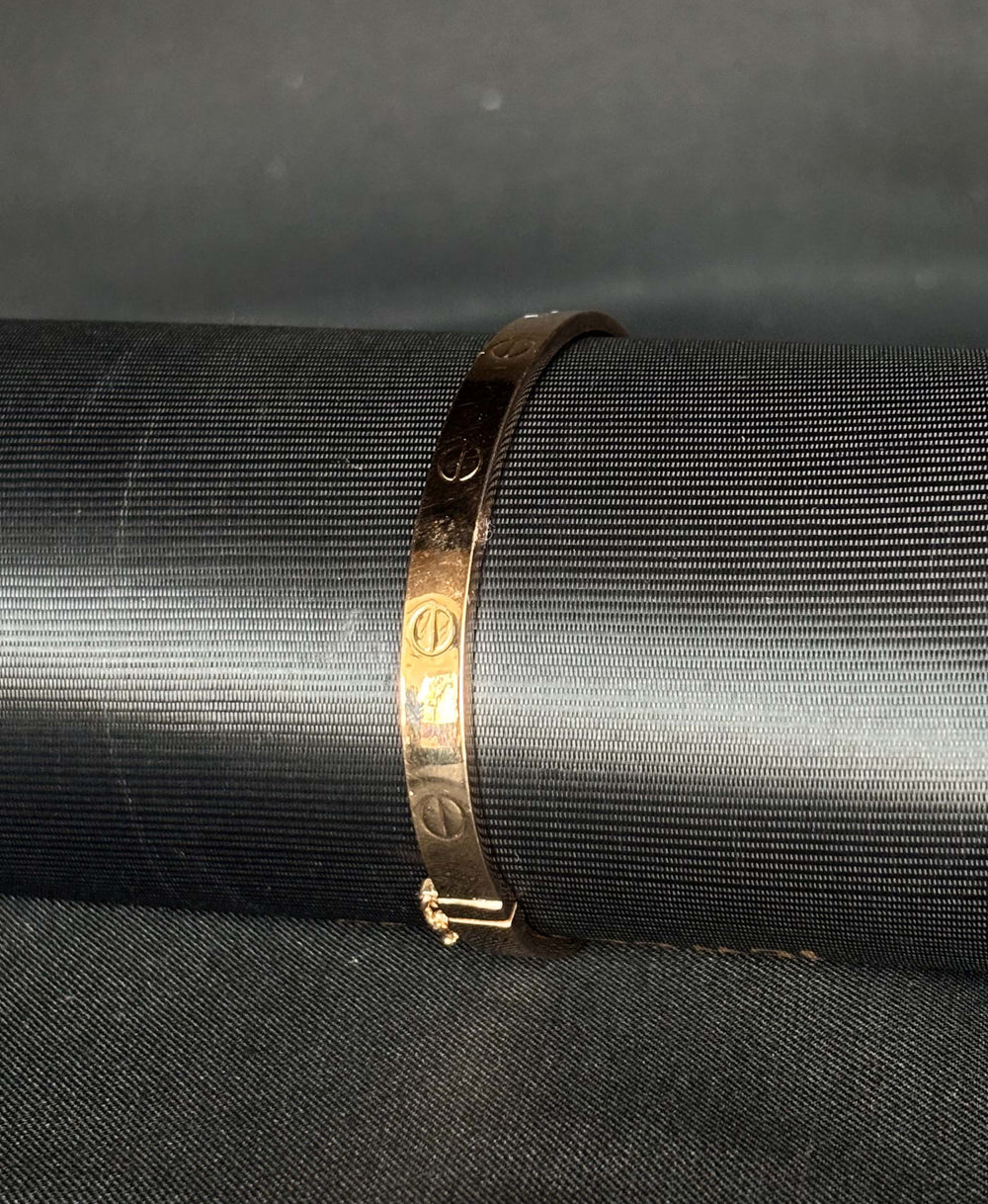 18KT Gold Bangle with Iconic Screw Motif
