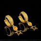 22K Yellow Gold Ribbed Bali Earrings with Dangling Star Charms