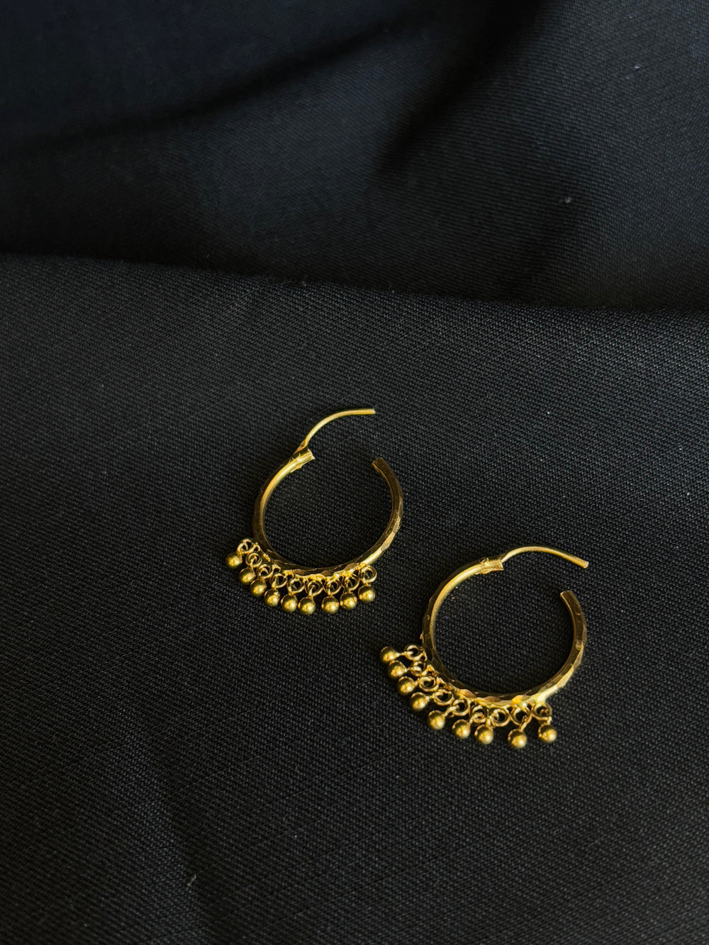 Classic 22K Gold Hoop Earrings with Dangling Beads.