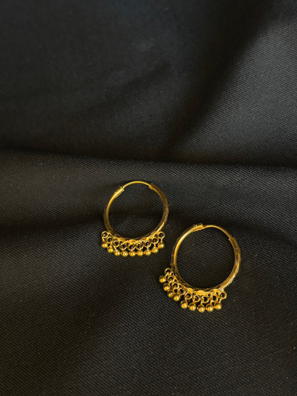Classic 22K Gold Hoop Earrings with Dangling Beads.