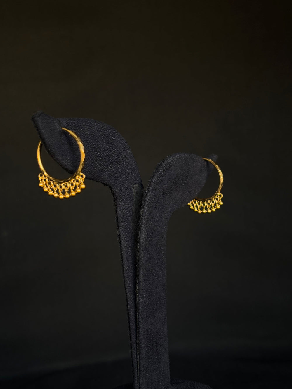 Classic 22KT Gold Hoop Earrings with Dangling Beads.