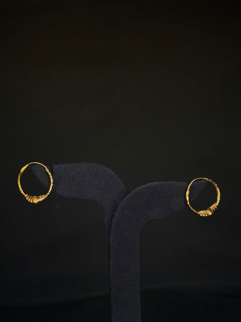 Distinctive 22K Gold Textured Hoop Earrings.