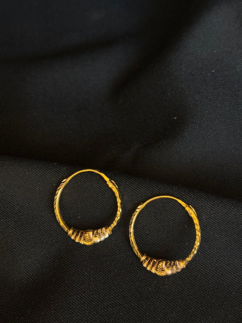 Distinctive 22K Gold Textured Hoop Earrings.