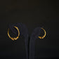 Distinctive 22K Gold Textured Hoop Earrings.