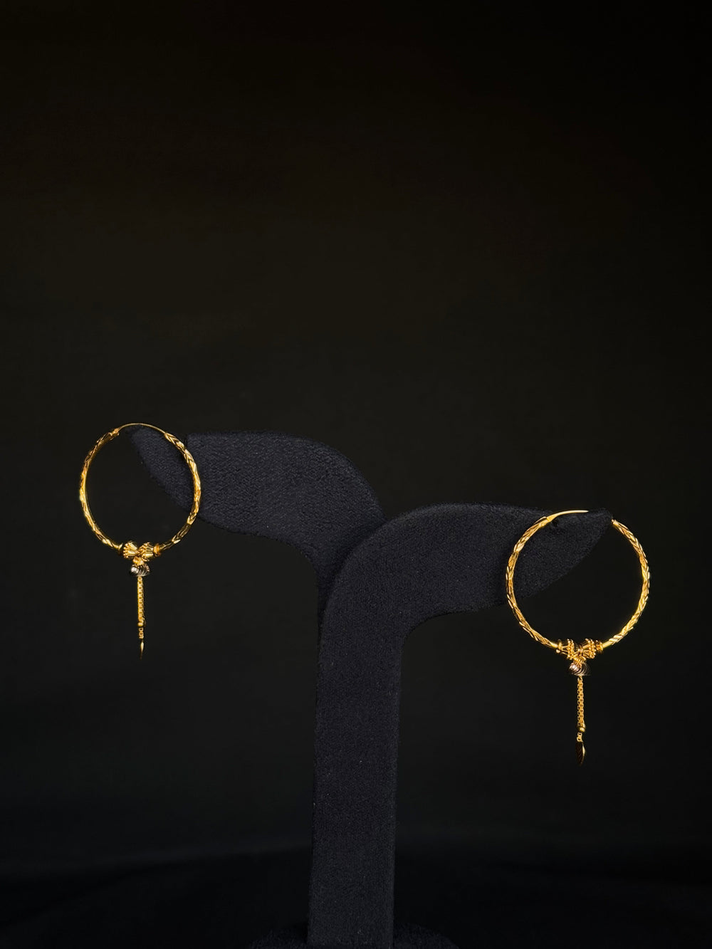 Elegant 22K Gold Hoop Earrings with Dangling Pendant Details.