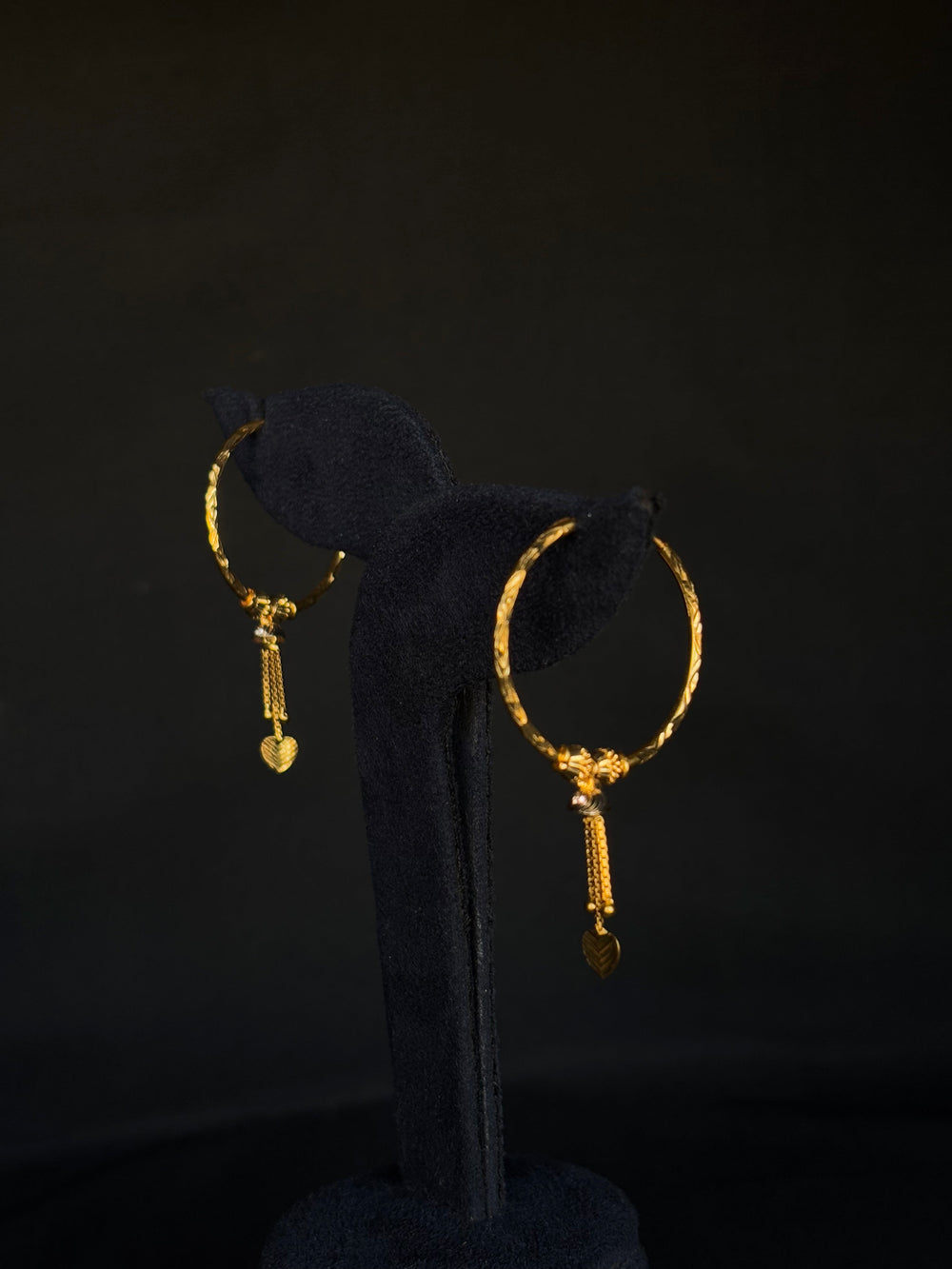 Elegant 22K Gold Hoop Earrings with Dangling Pendant Details.