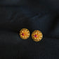 Elegant 22K Gold Floral Stud Earrings with Gemstone Center.