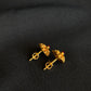 Elegant 22K Gold Floral Stud Earrings with Gemstone Center.
