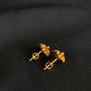 Elegant 22K Gold Floral Stud Earrings with Gemstone Center.