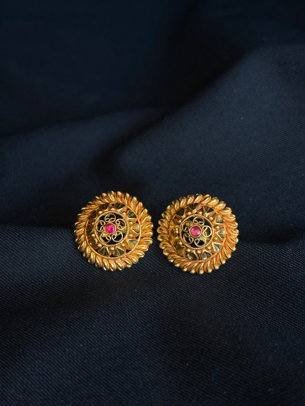 Artisan 22K Gold Circular Stud Earrings with Gemstone Accent.