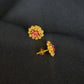 22K Gold Floral Stud Earrings with Vibrant Center Detail.