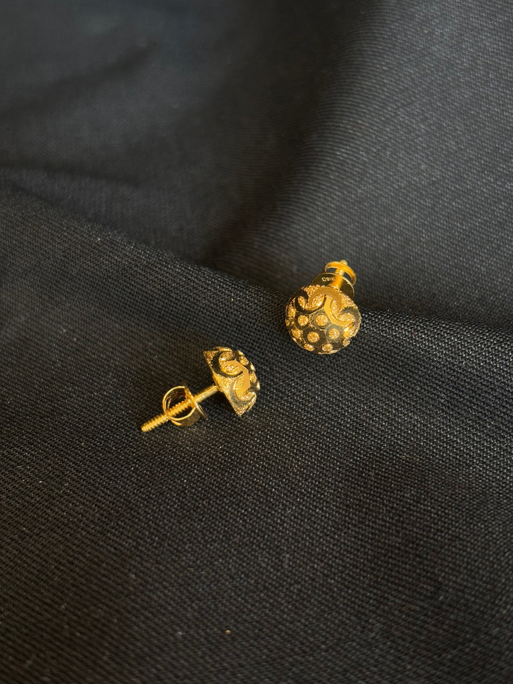 22KT Gold Dome Stud Earrings with Detailed Pattern.