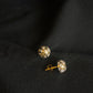22K Gold Oval Stud Earrings with Floral/Starburst Design.