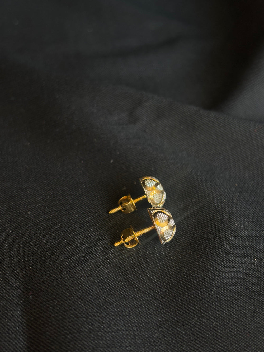 22KT Gold Oval Stud Earrings with Floral/Starburst Design.