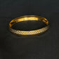 22K Gold Sikh Kara with Distinctive Black & Gold Design