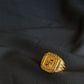 22K Gold Gents Ring with Swastik Symbol & Patterned Border.