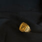 22K Gold Gents Ring with Swastik Symbol & Patterned Border.