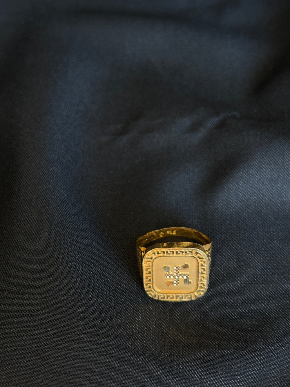 22KT Gold Gents Ring with Swastik Symbol & Patterned Border.