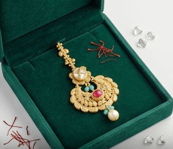 Elegant 22KT Gold Filigree Maang Tikka with Ruby & Emerald Accents