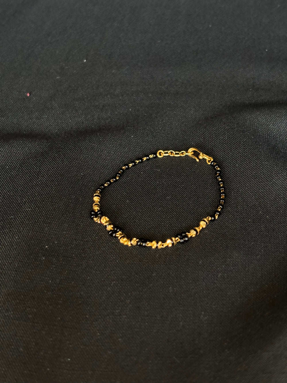 22KT Gold and Black Bead Bracelet