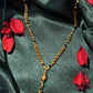 22K Gold and Black Bead Mangalsutra with Intricately Woven Chain and Pendant
