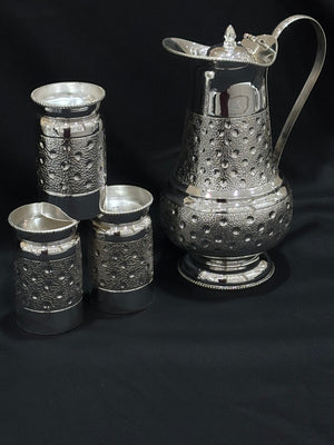 925 sterling silver water jug set, featuring a beautifully hammered texture and intricate detailing.
