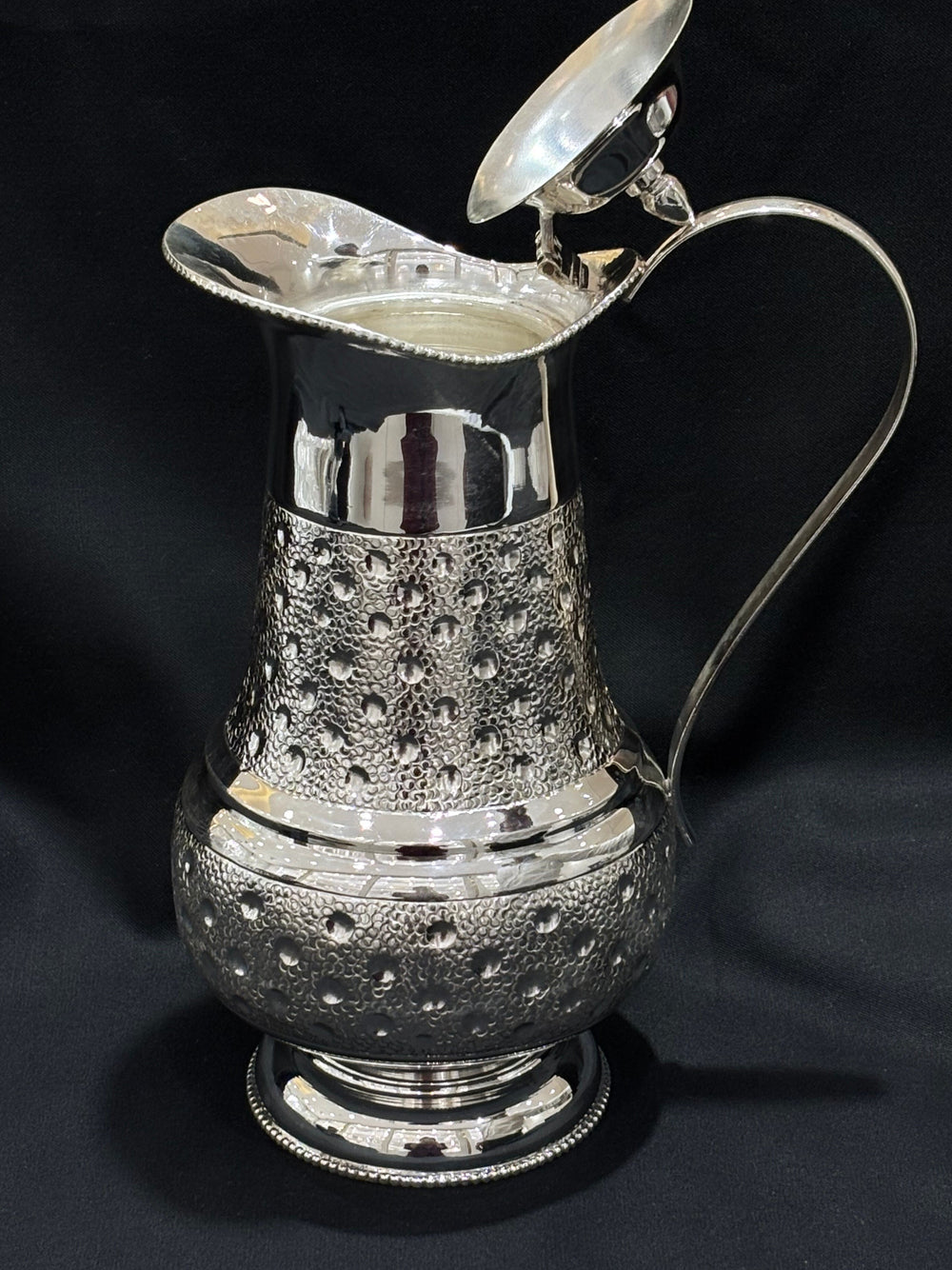 925 sterling silver water jug set, featuring a beautifully hammered texture and intricate detailing.