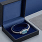 Sky Blue Halo 92.5 Sterling Silver Hinged Bangle