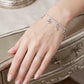 Celestial Infinity Charm Sterling Silver Tennis Bracelet