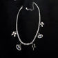 Divine Eye & Bow Sterling Silver Charm Tennis Bracelet
